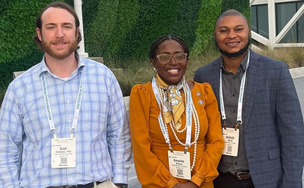 Dr. Scott Widmann, Dr. Esther Olaleye, and Dr. Kehinde Idowu at the Georgia World Congress Center